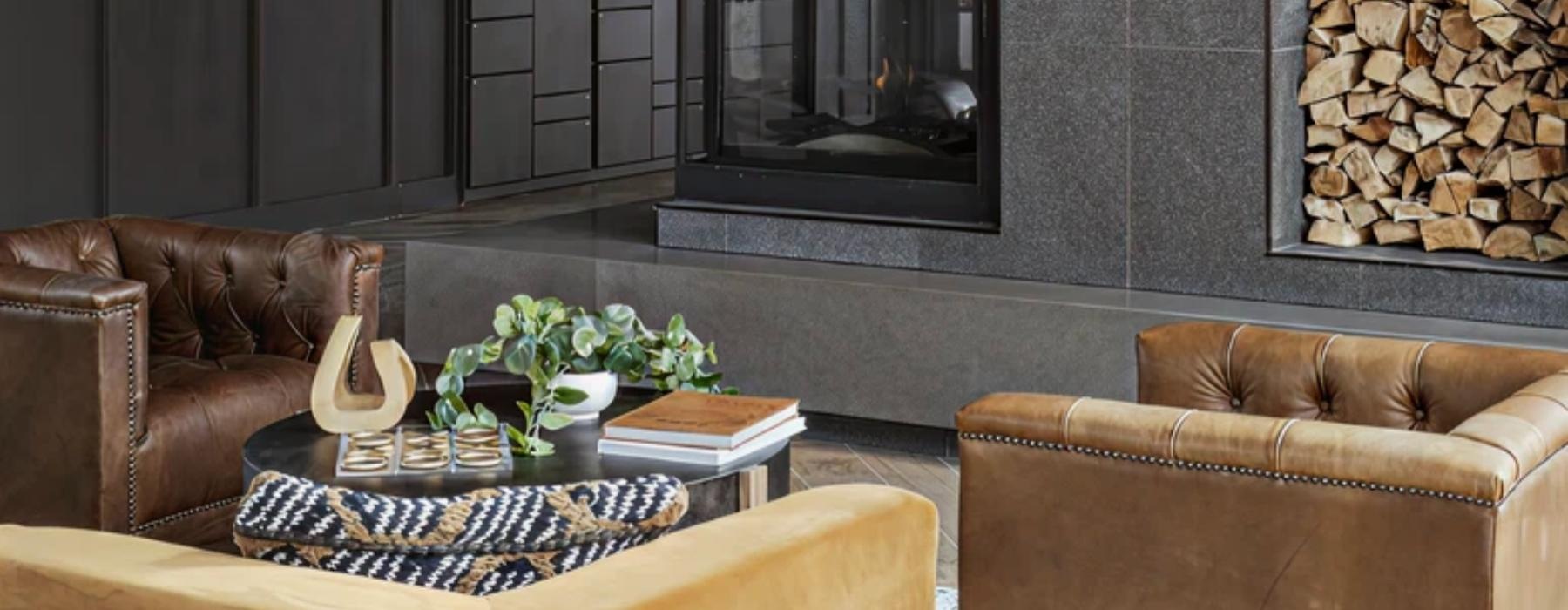 a clubhouse room with a fireplace