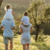 a family walking through a field