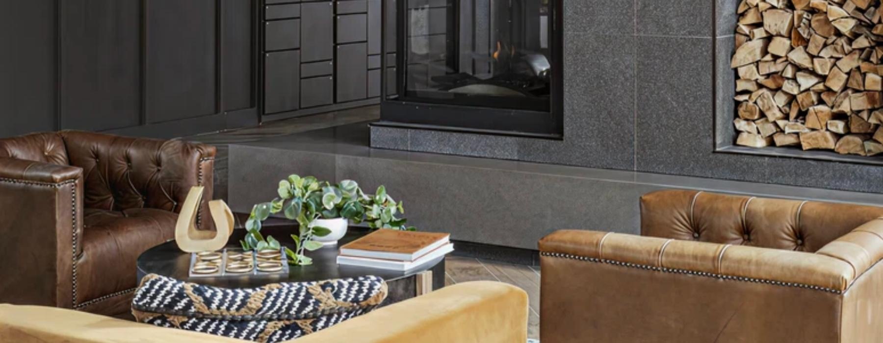 a clubhouse room with a fireplace