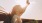 a woman with her hand in the air