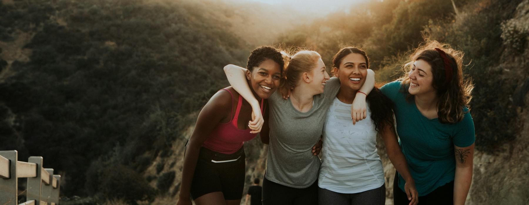 a group of women posing for a photo
